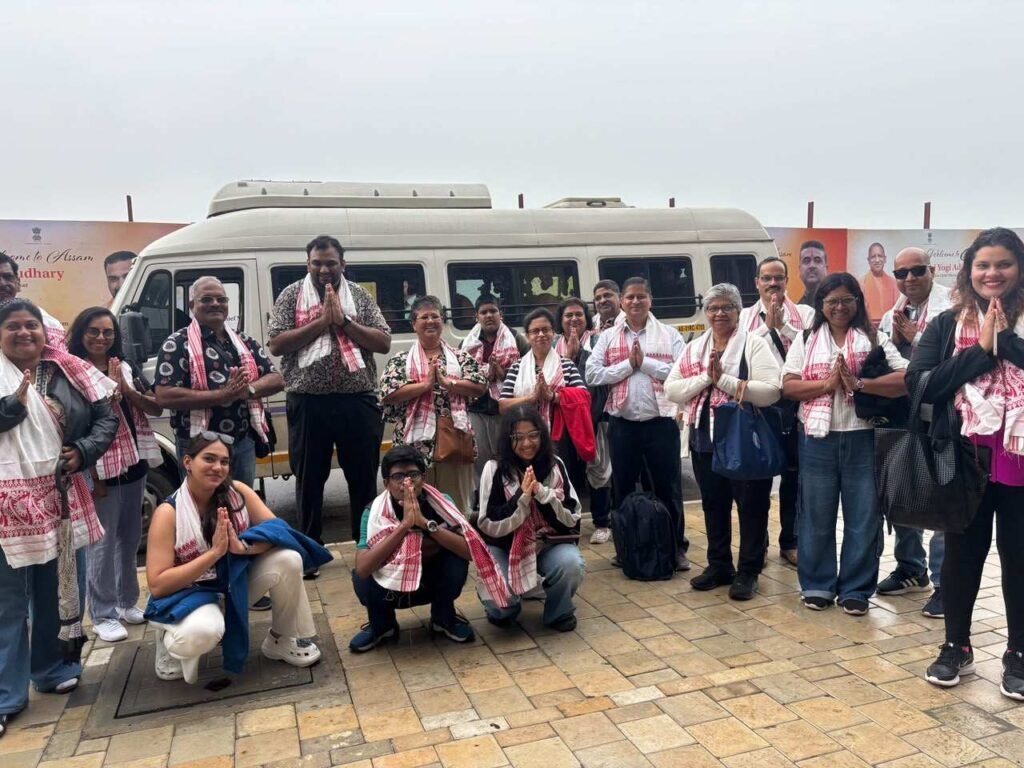 Travel group beside their vehicle