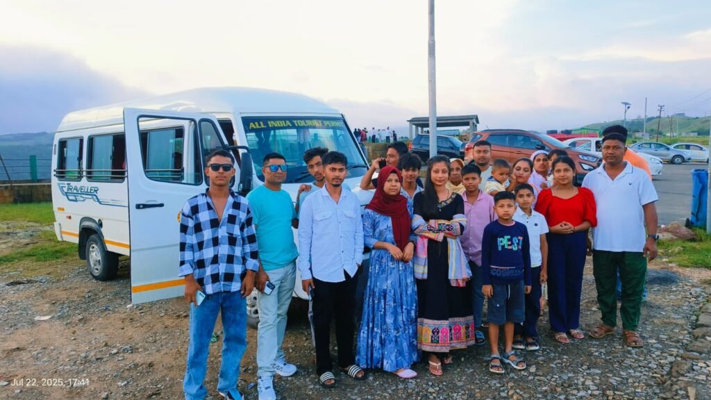 Travellers gathered beside their vehicle