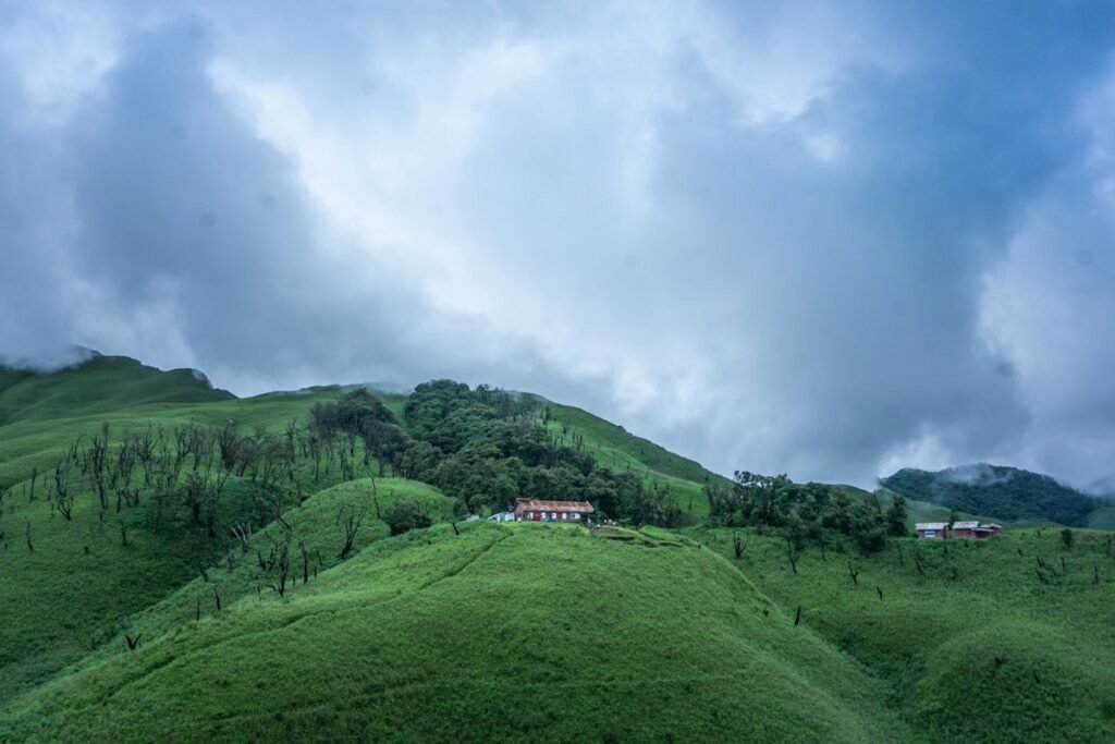 Green hills and guest house in Dzukou Valley, Nagaland